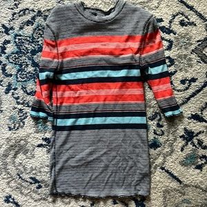 Stretchy Free People top! I use to wear a good amount of times when I was 19!